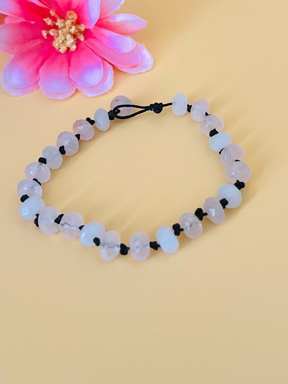 Rose quartz beaded bracelet black strings